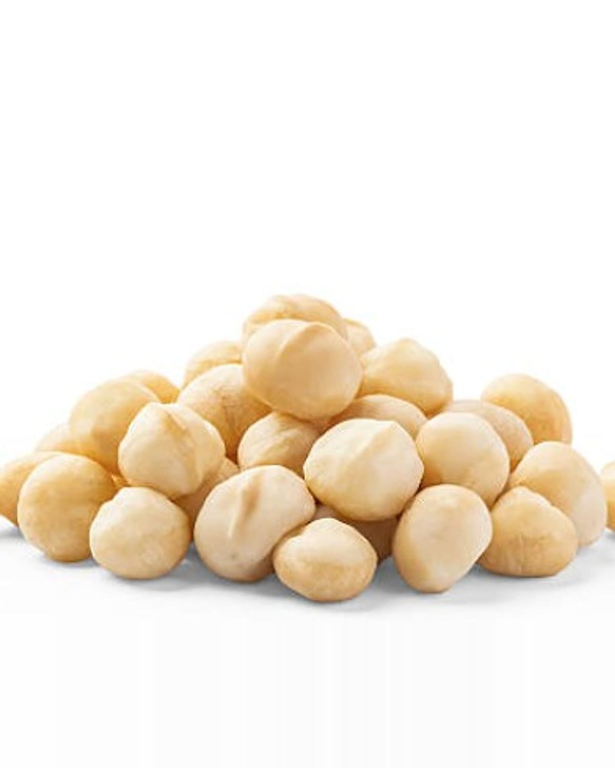 A pile of whole macadamia kernels on a white background